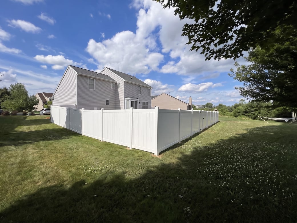 White vinyl privacy fence installed by A2 Craftsmen