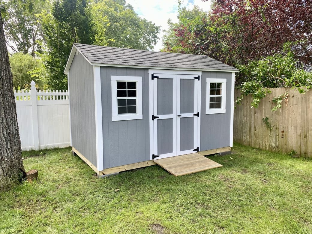 Custom sheds in different siding colors by A2 Craftsmen